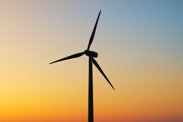 Fototapeta premium Wind turbine silhouette against vibrant gradient sunset sky background with soft light and clean energy concept in creative composition. Ai generative