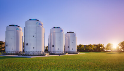 Naklejka premium Group of smr or small modular nuclear reactors power plant against twilight sky