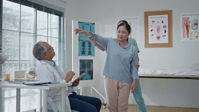 Asian professional doctor providers deliver consultation to senior woman patient.healthcare help,feedback or support,optimal wellness.medical with Asian doctor talking or speaking of test results
