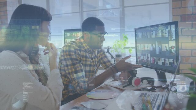 Man leaning and tapping monitor, causing overlay while woman reviewing thumbnail grid for marketing