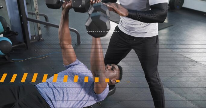 Lifting lifter wearing purple shirt pressing hex-head dumbbells on bench at gym, spotter assisting