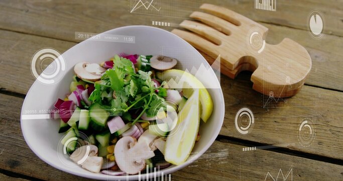 Displaying white ceramic bowl holding salad on rustic table, showing wooden servers and AR overlays