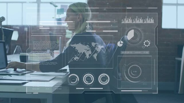Seated woman typing using trackpad for business charts updating while colleague handing folder