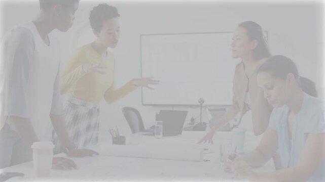 Four women in business meeting, reviewing documents to align plans and activating overlay lines