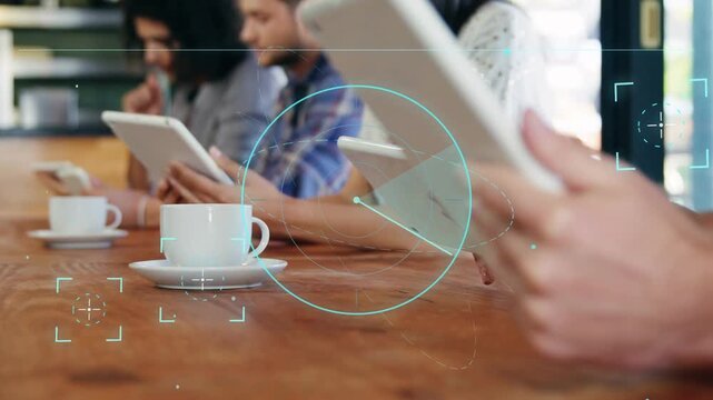 Three men in coffee shop using tablets, right angling tablet starting teal HUD tracking for tech