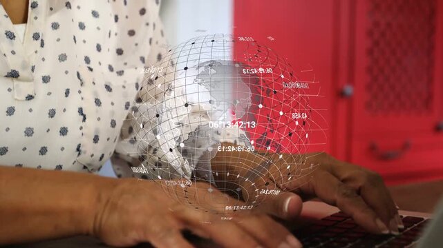 Mature woman typing on laptop, causing globe over keys as camera panning up, analyzing tech data