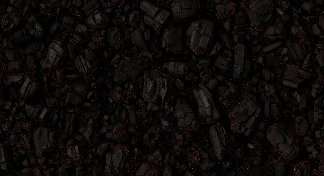 Close up of burning charcoal with glowing red embers background