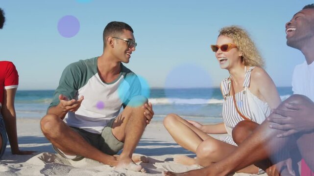 Central man narrating on shore, causing blue purple cyan marketing overlays while friends laughing