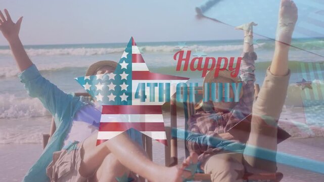 Senior couple in striped chairs beachside, waving and causing star flag overlay marking 4TH OF JULY