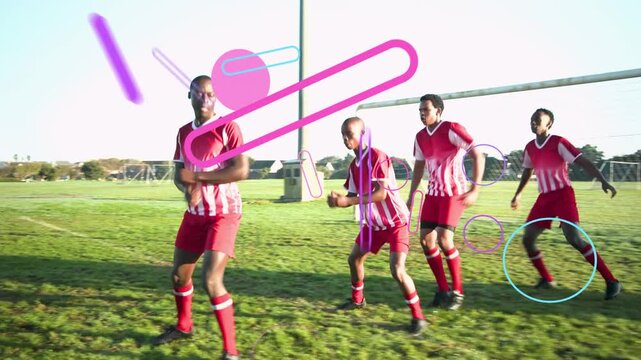 4 male soccer players stepping on pitch, camera panning sparking shapes overlaying them for drill