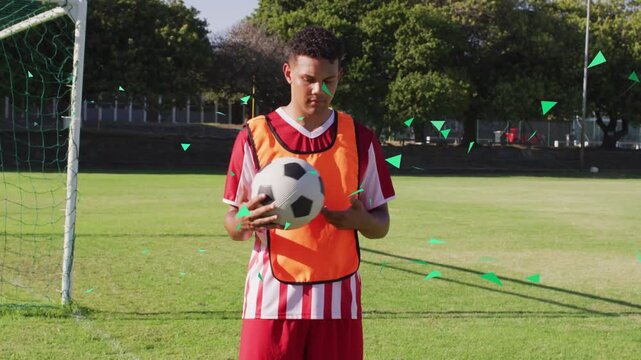 Soccer player initiating ball shifting and rotating for practice with green triangles overlaying