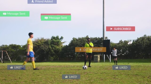 Yellow player stepping, striking to score as social alerts overlay field, keeper diving
