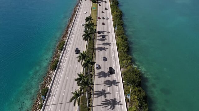 Car traffic road highway. Urban traffic hyperlapse. Road way with car. Cars hyperlapse on causeway road. Urban roadway hyperlapse. MacArthur Causeway. Roadway Downtown Miami to Miami Beach
