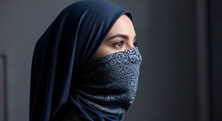 Naklejka premium Portrait Of A Woman Wearing A Hijab And A Decorative Face Covering