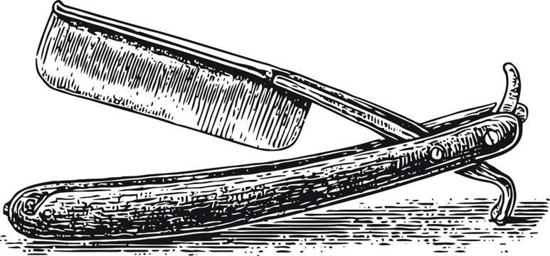 Vintage straight razor with open folding blade in detailed engraving