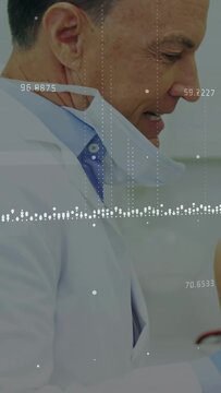 Vertical video: Clinician checking chart, touching patient arm for exam, overlay showing deltoid