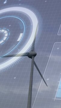 Vertical video: Wind pushing turbine spinning clockwise, yawing and showing HUD data for monitoring