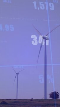 Vertical video: Ping causing overlay, turbine blades turning, numbers forming month bars for output