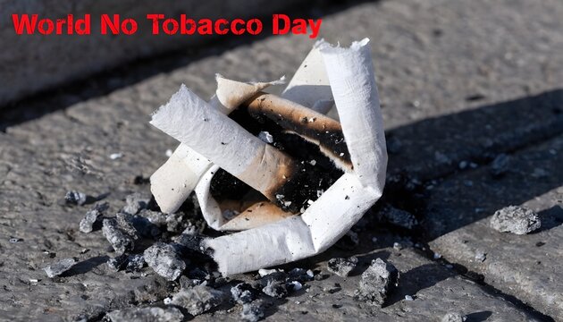 Crushed cigarette filter on ground for World No Tobacco Day