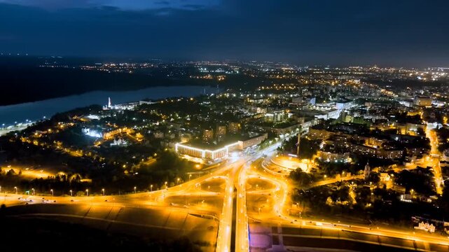 Kaluga, Russia. Entrance to the city center of Kaluga Gagarin interchange and Gagarin bridge. Night illumination. Drone footage