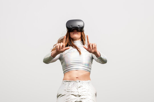 Gamer interacting with virtual reality headset outdoors in Granada