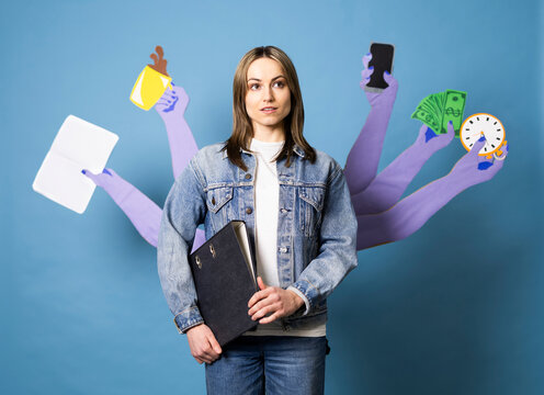Businesswoman with multiple arms managing heavy multitasking
