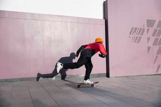 Skateboarder in motion in El Raval Barcelona
