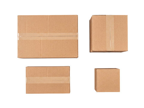 Collection of four brown cardboard boxes of various sizes, sealed with tape, on transparent background.