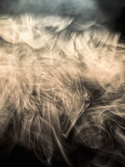 Obraz premium abstract monochrome smoke pattern in the dark on a black background