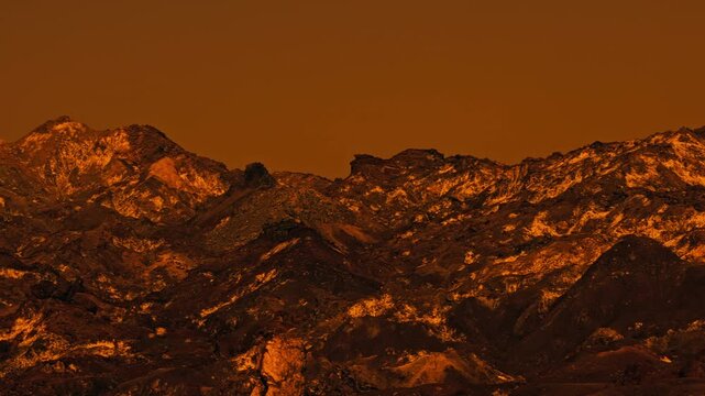 Martian landscape with rocky terrain and unique rock formations under an orange sky. Landscape of the red planet. Barren surface of a dry planet with desert ground and dramatic atmosphere