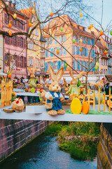 Naklejka premium Historic Colmar streetscape with decorative Alsatian architecture at dusk