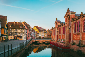 Obraz premium Colmar historic center at sunrise with intense colors and no visitors in Alsace France