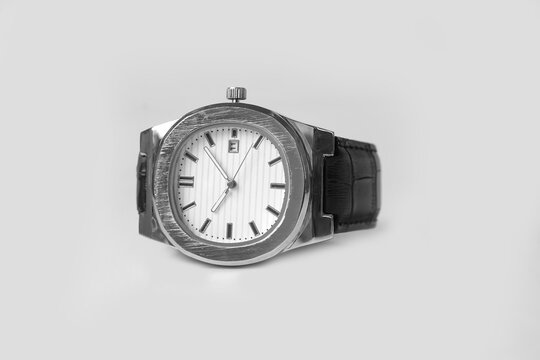 Luxury Silver Wristwatch with Black Leather Strap Isolated on White Background