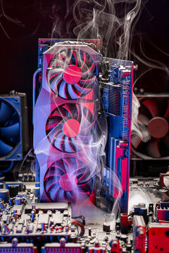 Burning graphics card overheat and malfunction electronics parts.
