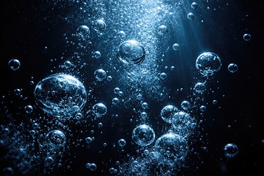 air bubbles enriched with oxygen underwater dark background