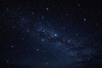 Fototapeta premium Dark night sky filled with sparkling stars for backdrop