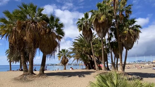 View of Playa de los Tarajales beach in Los Cristianos, Tenerife,Canary Islands,Spain,4K.
