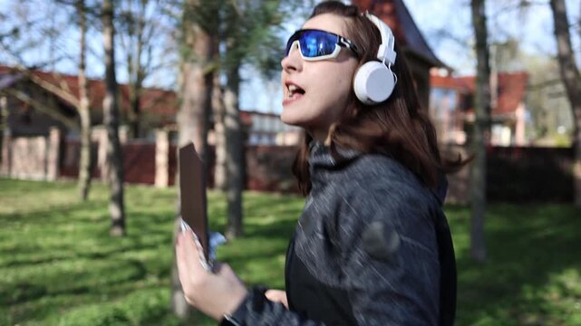 Woman jogging outdoors eating chocolate during workout showing sugar craving and difficulty sticking to diet reflecting modern struggle with self control habits and food dependence
