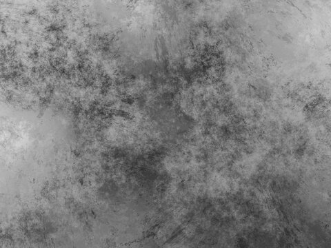 Dark mottled silver metal background with grainy textures and industrial gray tones.
