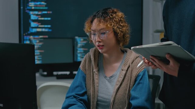 Adult male,asian female freelance typing write prompt AI bot IT app smart program,develop agentic ai,terminal with coding language,ux ui interface,designer,big data server center,quantum computer.