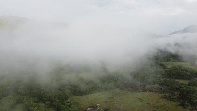 Mystical Valley Fog Rolls Over Hills