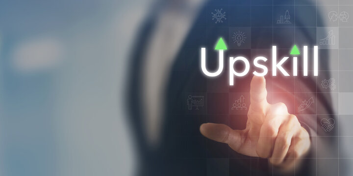 Upskilling workforce, digital learning transformation. Touching Upskill on digital interface, workforce development, continuous learning and skill enhancement for future career in a technology driven.