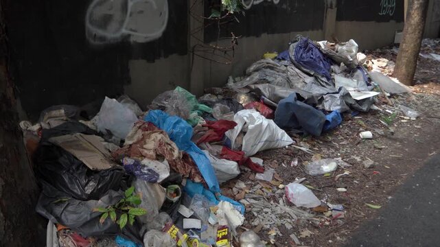 A Pile Of Garbage On The Side Of The Road