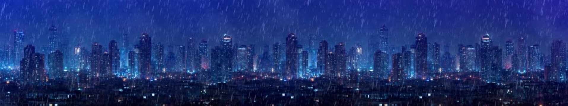 Futuristic Rainy City Skyline at Night with Blue Neon Lights in Widescreen Panorama