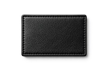 Naklejka premium Black leather patch positioned on a smooth white background featuring clipping path