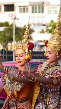 Traditional Thai Khon Dancers Performing in Ornate Costumes at Wat Suthat
