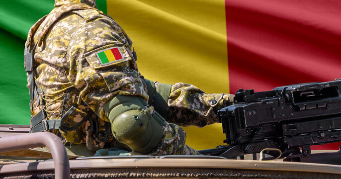 Mali flag with soldier at machinegun turret