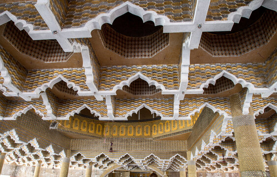 View of intricate geometric patterns and ornate arches adorn the ceiling, creating a mesmerizing visual tapestry, Tangail, Dhaka Division, Bangladesh.