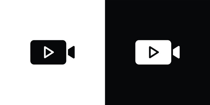 Black and white play pause media control buttons on dark background play button pause button
