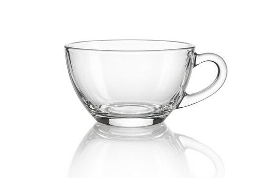 Isolated crystal clear teacup on smooth white reflective background with clipping path